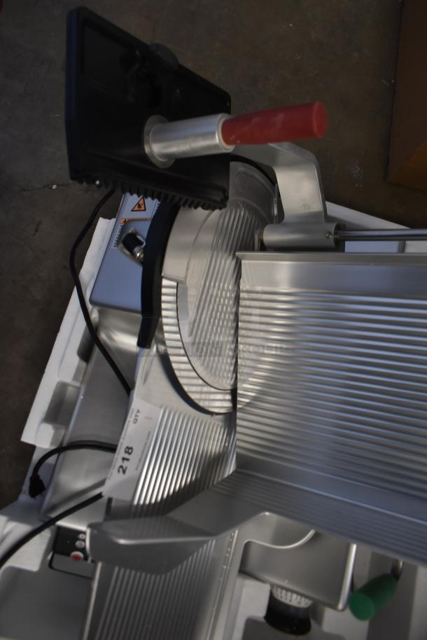 2023 Bizerba GSP HD 13" automatic meat slicer, heavy-duty metal, illuminated, 120V, in excellent condition.