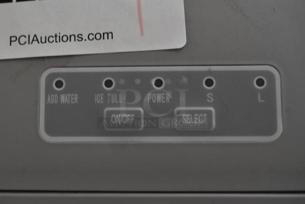 Frigidaire EFIC130-SS stainless steel ice maker control panel, showing buttons for on/off, select, and status indicators.