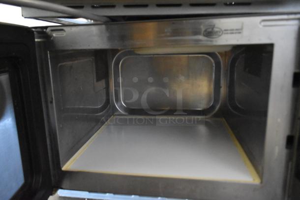 2018 Amana RCS10TS stainless steel commercial countertop microwave oven interior, showing clean surfaces, 120 volts, 1 phase.