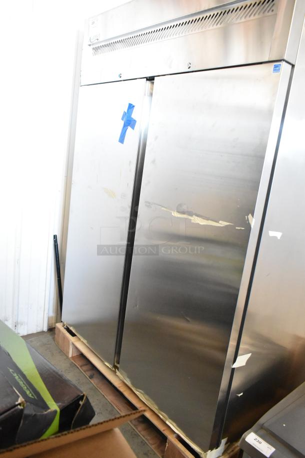 Avantco Stainless Steel 2 Door Reach In Cooler, commercial grade, 115 volts, 1 phase, visible wear on doors, on pallet.