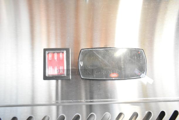 Avantco stainless steel control panel of a 2-door commercial reach-in cooler, showing power and temperature display.