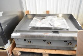 Brand new Cooking Performance Group 351GTCPG36NL stainless steel flat top griddle, thermostatic controls, 90,000 BTU.