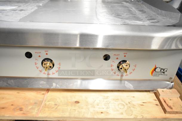 Brand new Cooking Performance Group stainless steel flat top griddle, model 351GTCPG60NL, 150,000 BTU, thermostatic controls.