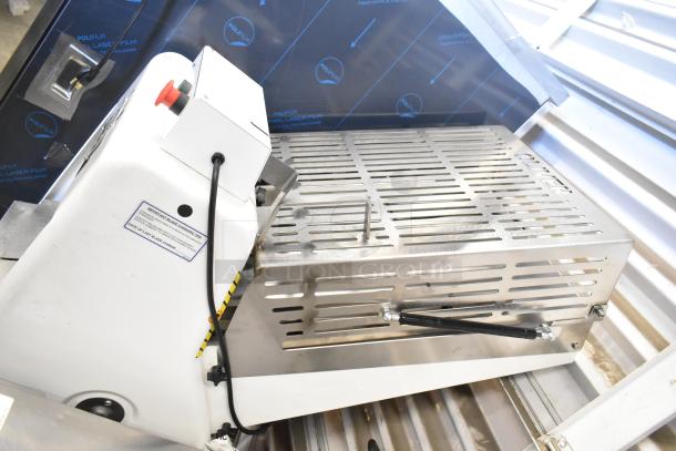 Oliver 797-32NC metal commercial bread slicer, white and stainless steel, 115V, 1 phase, clean and functional.