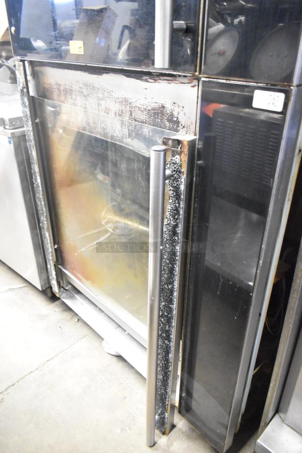 Fri-jado TDR7+7 P stainless steel rotisserie ovens, electric powered, broken glass on bottom oven, 208V, 3-phase.