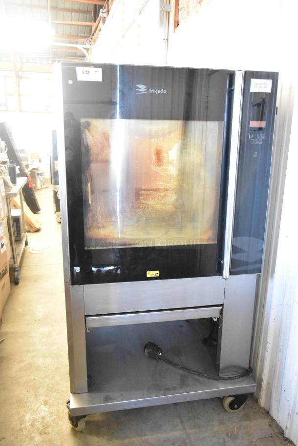 Fri-jado TDR7-P rotisserie oven, stainless steel, electric, 208V, 3 phase, on casters, visible markings, stained window.
