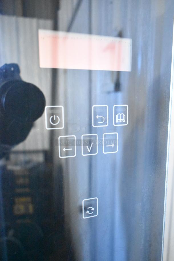 Fri-jado TDR7-P rotisserie oven control panel, touchscreen interface, stainless steel, 208V, 3 phase, good condition.