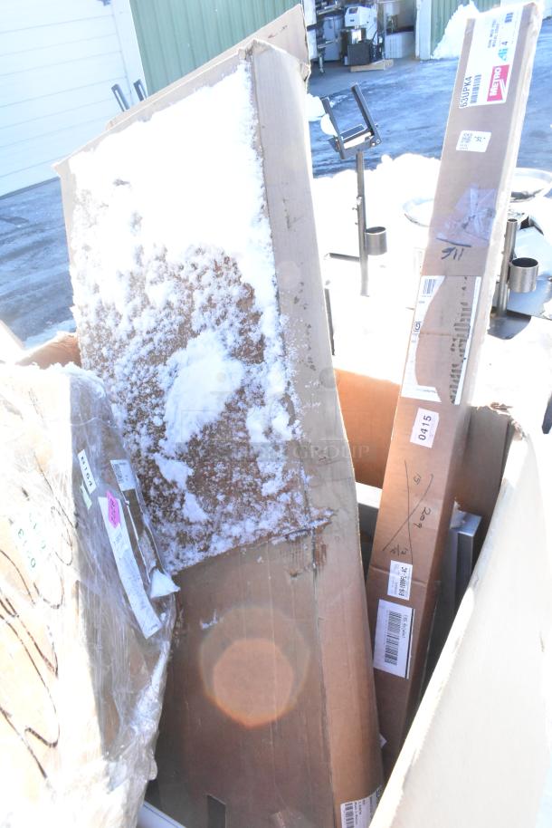 Four brand new scratch and dent items. Includes boxed gray posts, Carlisle sneeze guard, Bakers Lane ingredient bin, and ice bin.