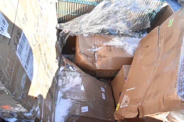 Boxes of 12 new scratch and dent items including fryer and chafer, enclosed in shrink wrap, labels visible.