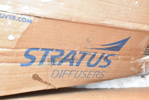 Cardboard box labeled "STRATUS Diffusers," possibly indicating one of the 12 scratch and dent items for auction.