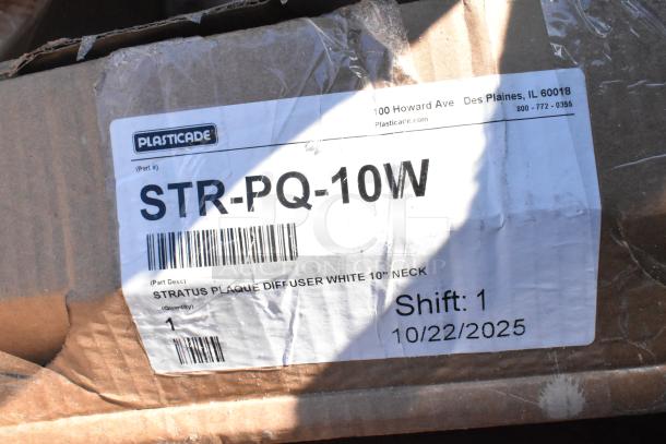 Cardboard box with “Plasticade STR-PQ-10W” label, showing part description and manufacturing date. Box shows signs of wear.