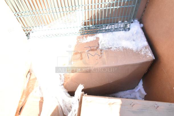 Cardboard box in winter conditions, part of auction lot including fryer and chafer. Box shows mild wear, marked "12".