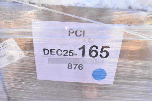 Wrapped pallet labeled "DEC25-165, 876" containing new scratch and dent items, including a sink and overshelves.