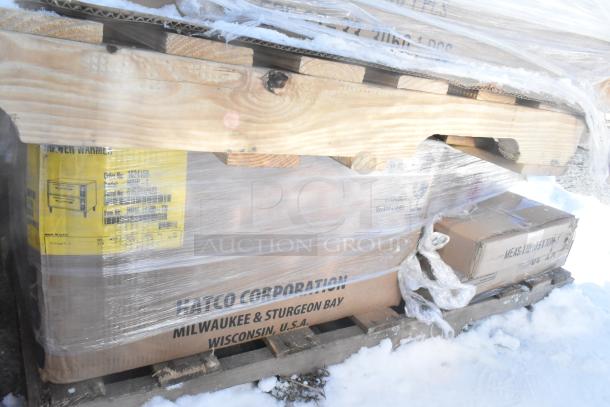 Pallet with 8 new scratch and dent items, includes Hatco food warming drawer, Avantco over shelf, wrapped in plastic.