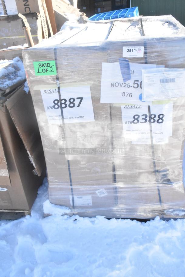 Skid with pallet wrapped items; labels indicate resale lot with upright vacuum and Avantco rice cooker; new, scratch and dent.