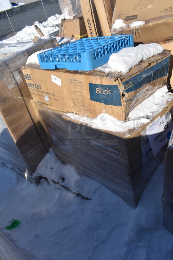 Cardboard boxes on snow containing four new, scratch and dent janitor carts by ALVEX. Box labels and packing visible.