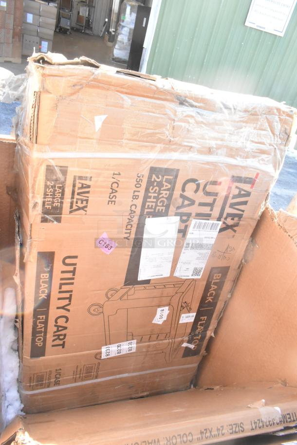 Cardboard boxes containing brand new scratch and dent items including a Lavex utility cart. Boxes show labels and packaging details.