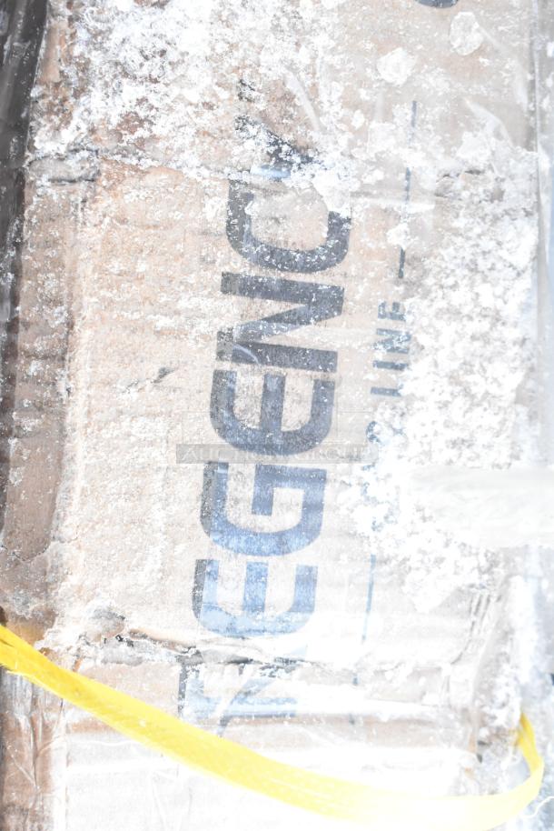 Box of Regency kitchen item showing brand name, covered in frost and snow, indicating new scratch and dent condition.