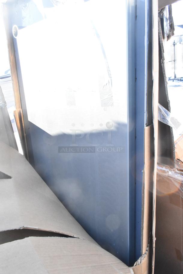 Seven brand new scratch and dent items including Bakers Lane Ingredient Bin, Regency Table, and Pan Racks in boxes.