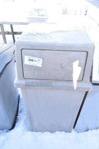 Poly Trash Can Shell with swinging flap lid, includes cup dispensers. Visible label shows auction lot number 260. Snow on top.
