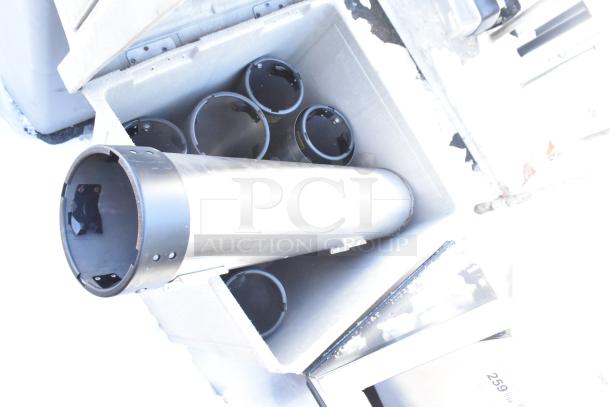 Poly trash can shell with swinging flap lid, includes multiple cup dispensers inside, shown in used condition.