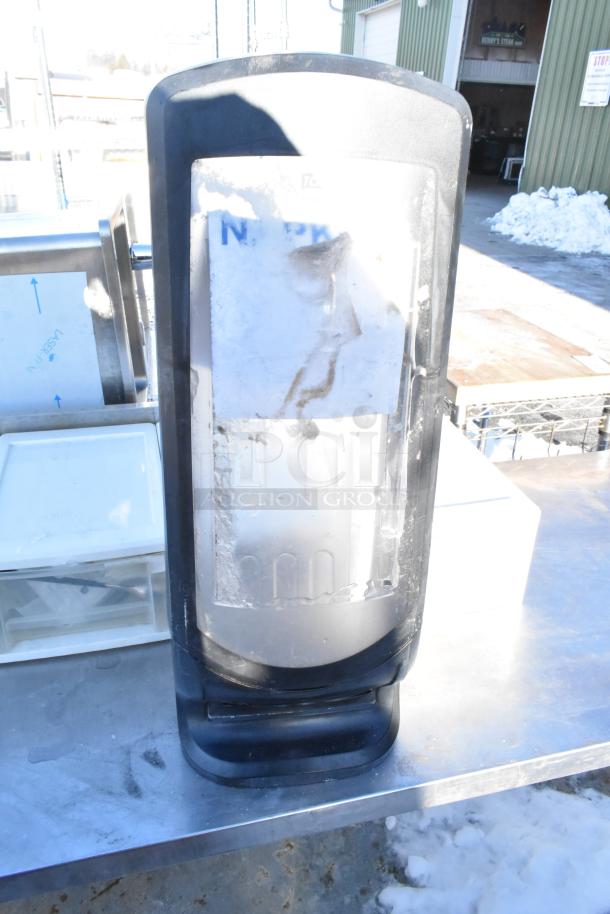 6 items auction lot: includes 4 poly drawers, a napkin dispenser, and whisks. Condition varies. Marked "6 Times Your Bid."