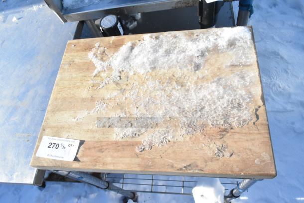 Chrome finish 2-tier wire shelving unit with a wooden top, showing signs of wear. Auction label numbered 270 visible.