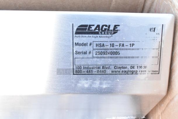 Tag on a 2025 Eagle HSA-10-FA-1P Foot Operated Hand Sink, detailing model and serial number. Item is brand new, scratch and dent condition.