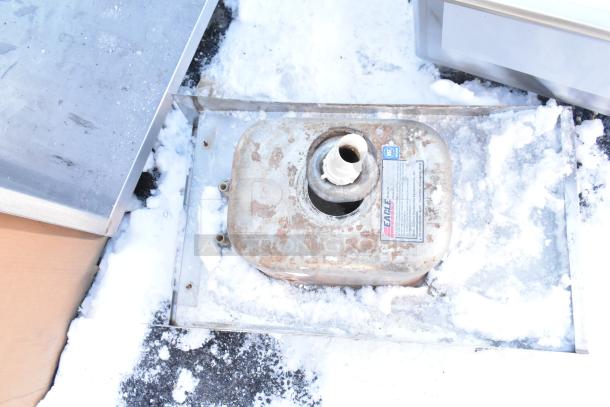 Stainless steel single bay sink, no legs, used condition, visible wear. Eagle brand with NSF label.