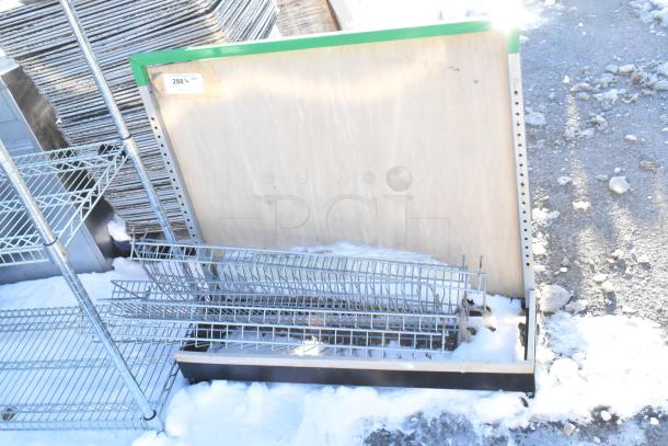 Metal display rack, new condition, with wire shelves, green trim, and numbered label "288-1, QTY." Ideal for retail use.