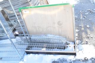 Metal display rack, new condition, with wire shelves, green trim, and numbered label "288-1, QTY." Ideal for retail use.