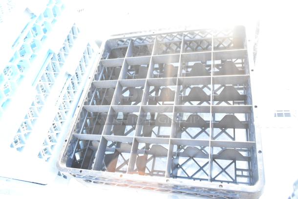 Lot of 14 black poly dish caddies, grid design, used condition, sturdy plastic, suitable for organizing dishes.