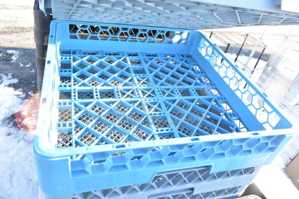 Lot of 14 blue poly dish caddies, stackable design, used for commercial dish storage. Good condition, visible lattice pattern.