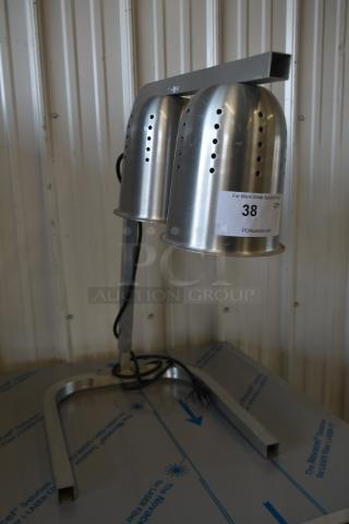 Avantco W62 countertop 2-head warming lamp, aluminum finish, 120 volts, 1 phase. Condition appears good. Label reads "38."