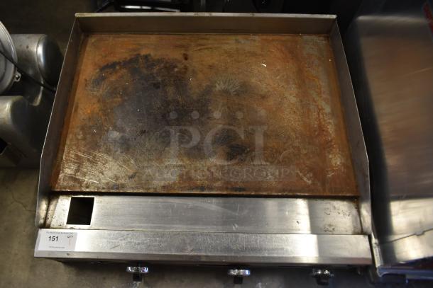 American Range commercial countertop flat top griddle with thermostatic controls, visible wear and rust on surface.