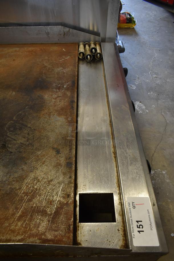 American Range commercial flat top griddle with thermostatic controls, showing wear and surface rust. Label reads "151 PCIAuctions.com".