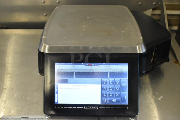 2017 Hobart HTs-7LS26 commercial scale, touchscreen display, metal body, tested and working, for portioning food. 