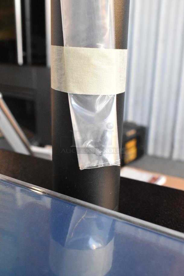 Mettler Toledo FreshWay Scale in original box, includes attached bag with screws, indicating complete condition.