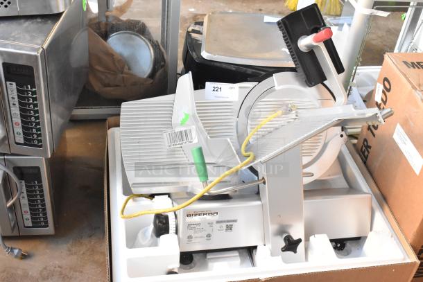 2023 Bizerba GSP HD commercial meat slicer, metal, countertop model, 120 volts, 1 phase, excellent condition, visible labels.