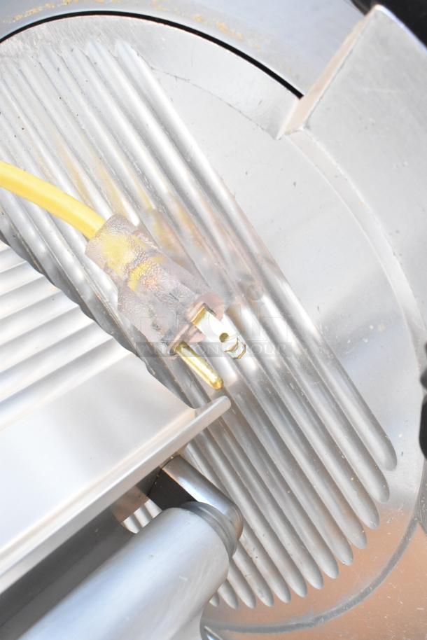 2023 Bizerba GSP HD countertop meat slicer, metal construction, 120 volts, commercial use, close-up view.