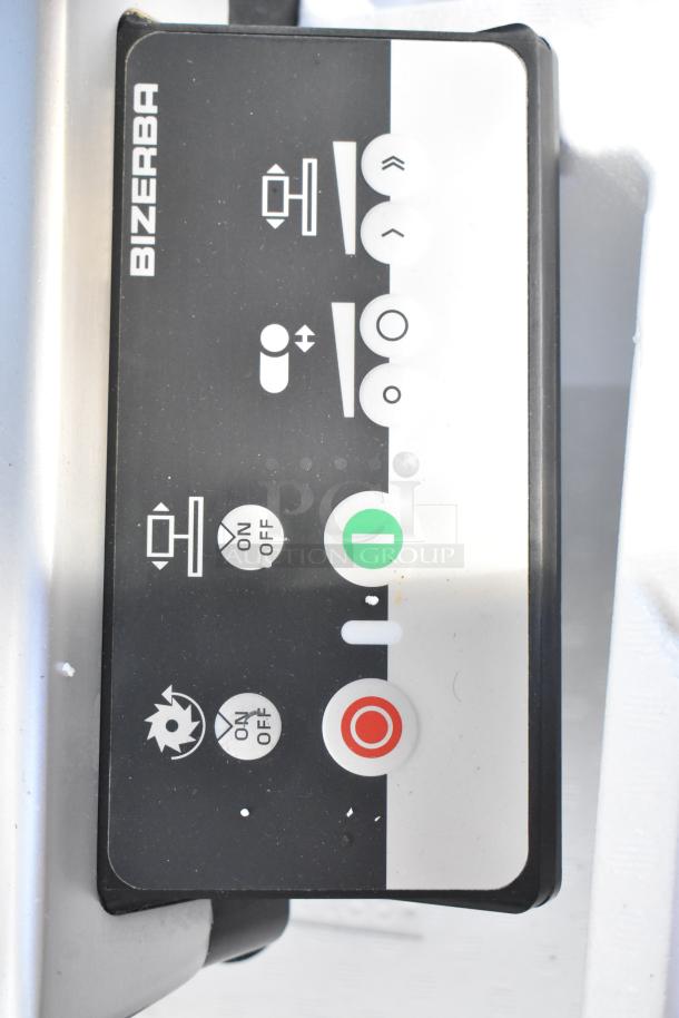 2023 Bizerba GSP HD 13" commercial meat slicer control panel, showing on/off buttons and operation symbols.