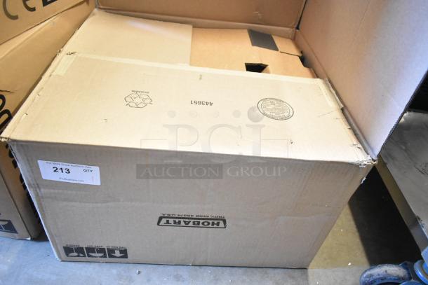 Hobart HTi-7LH4W countertop scale in cardboard box, label reads "Tested and Working!" with auction tag and manufacturer logo.