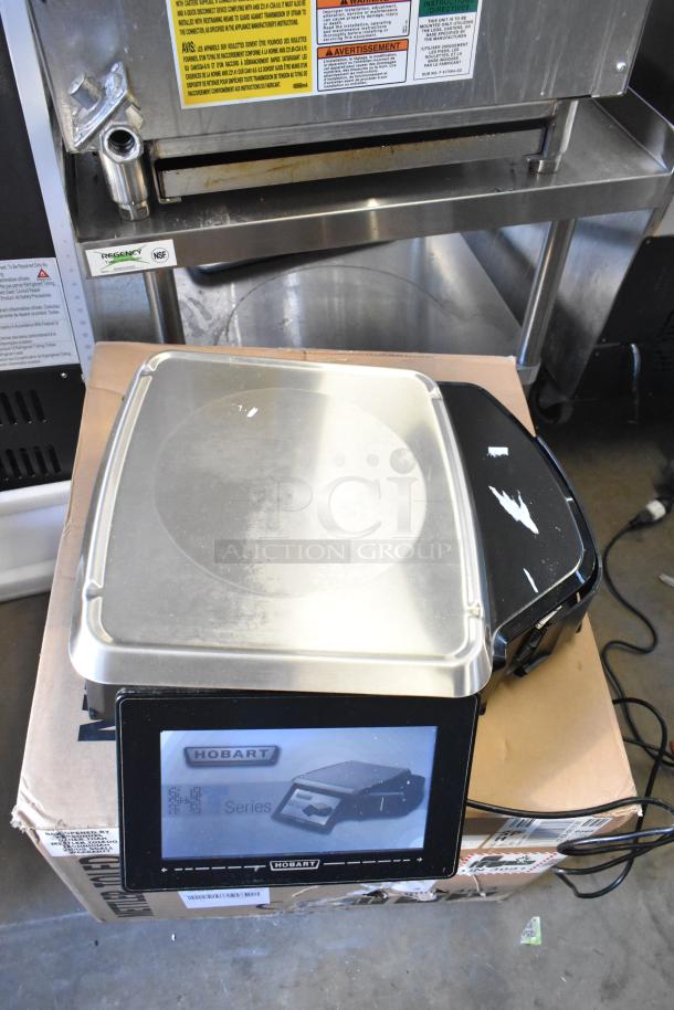 2017 Hobart HTi-7LH26 metal commercial countertop food portioning scale, tested and working, on cardboard box.