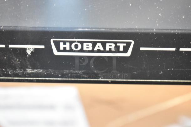 2017 Hobart HTi-7LH26 food portioning scale, black, tested working, for commercial use. Features "Hobart" logo.