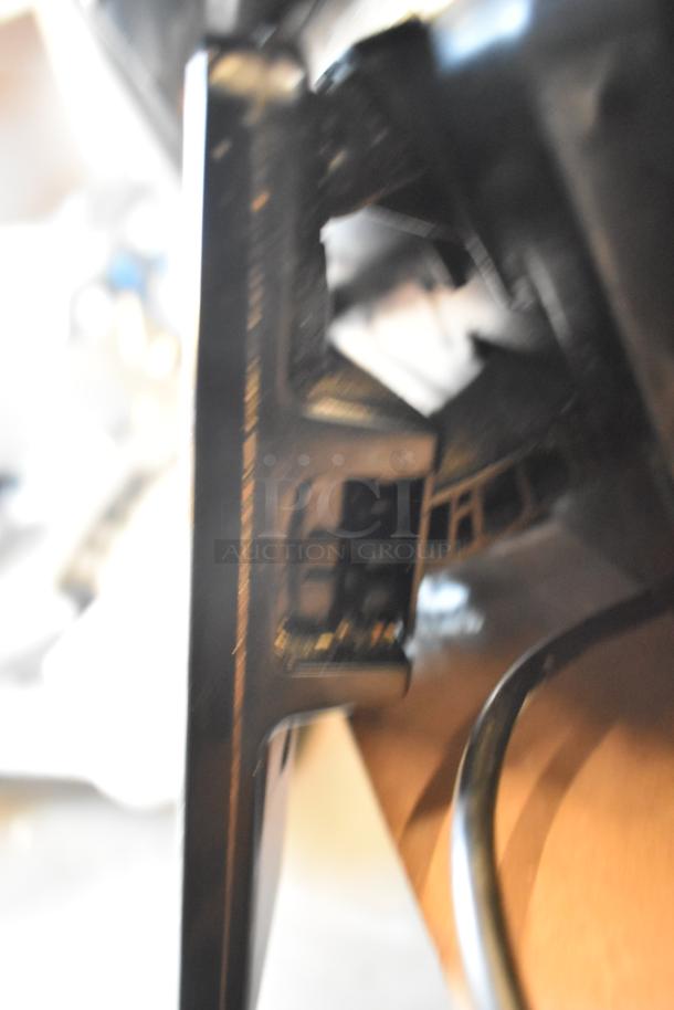 Alt text: 2017 Hobart HTi-7LH26 metal commercial countertop food portioning scale, 120/208-240 volts, 1 phase, tested and working.