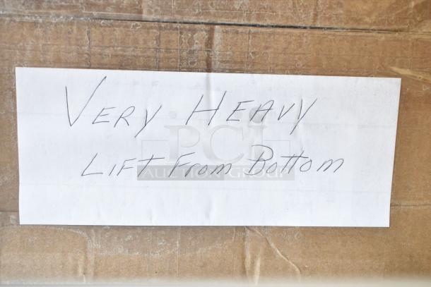 Arcobaleno AMF160 commercial pasta machine with accessories and manual. Note reads "Very Heavy, Lift From Bottom."