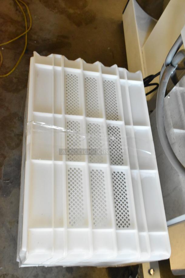 Arcobaleno AMF160 commercial pasta machine with multiple attachments, on casters, 220/380V, 3 phase. Includes cutters, molds, and manual.