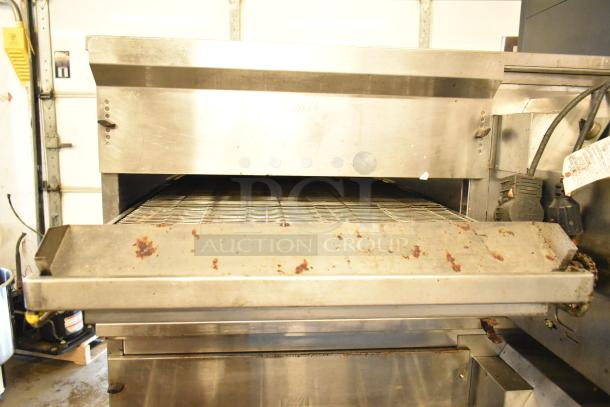Middleby Marshall PS638G stainless steel conveyor pizza oven, commercial casters, natural gas, 89,000 BTU, pre-owned.