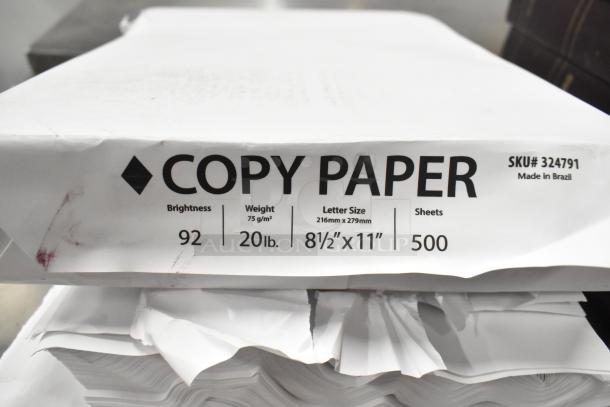 Ream of copy paper, 92 brightness, 20lb, letter size 8.5x11", 500 sheets, SKU 324791, made in Brazil. Creased packaging.