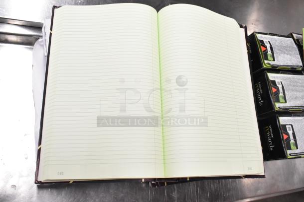 Lot with open lined notebook, Lexmark printer cartridges, and additional items. Ideal bulk office supply collection.